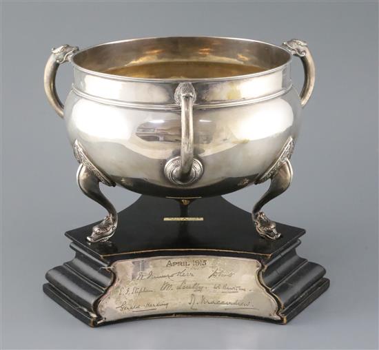 A George Irish silver three handled bowl by T. Weir & Sons, Dublin, 1913, on tripod supports, diameter 23cm ex. handles, 41.5 oz.